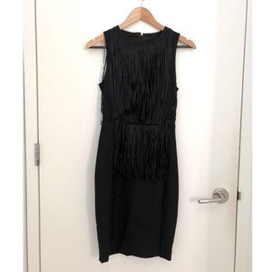 MNG sleeveless fringe skirt with front slit